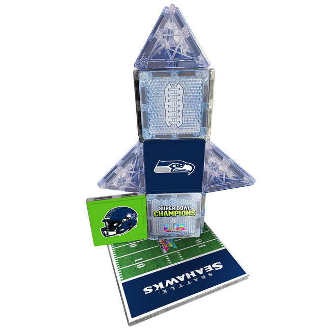 Stack of trading cards featuring a football design and Seahawks logo on a white background
