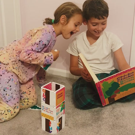 Two children playing with toys on the floor in a room. with Chicka Chical Boom Boom Magnetic Tile Set