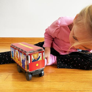 Girl Playing With Daniel Tiger Trolley Magna-Tiles by CreateOn