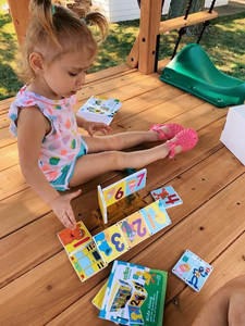 Girl Playing with CreateOn Magnatiles