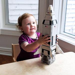 Small Child Playing with Rocket Ship Magna Tile Structure Set