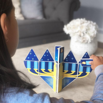 Girl Playing with Hannukkah Menorah Magnatile Structure Set