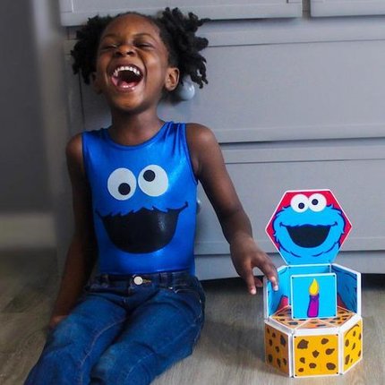 Girl Laughing Next to Cookie Monster Manga Tile Structure Set